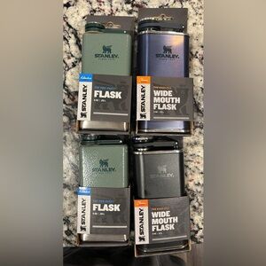 Stanley 8 oz flasks. 4 - 1 black, 2 green, 1 navy.